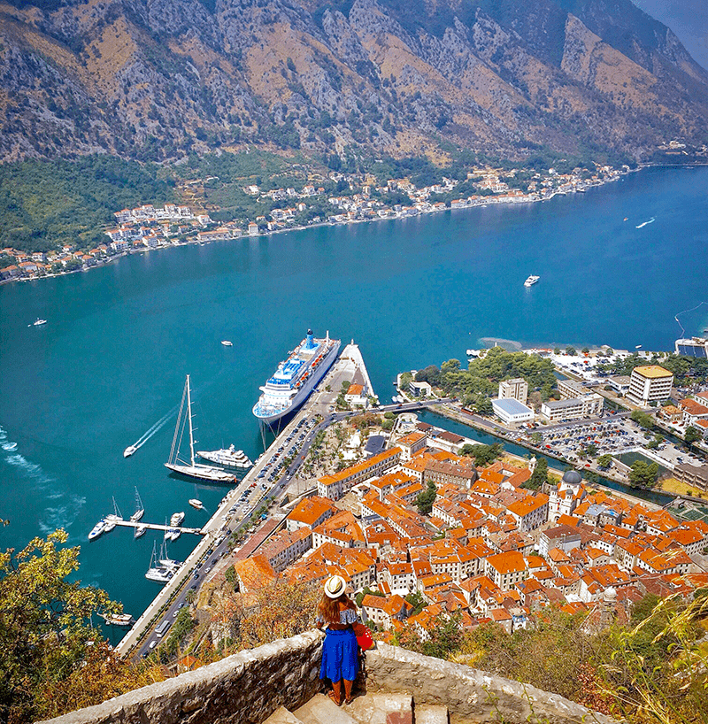 young happy girl admires on sea and beautiful land 2024 10 17 10 16 39 utc min